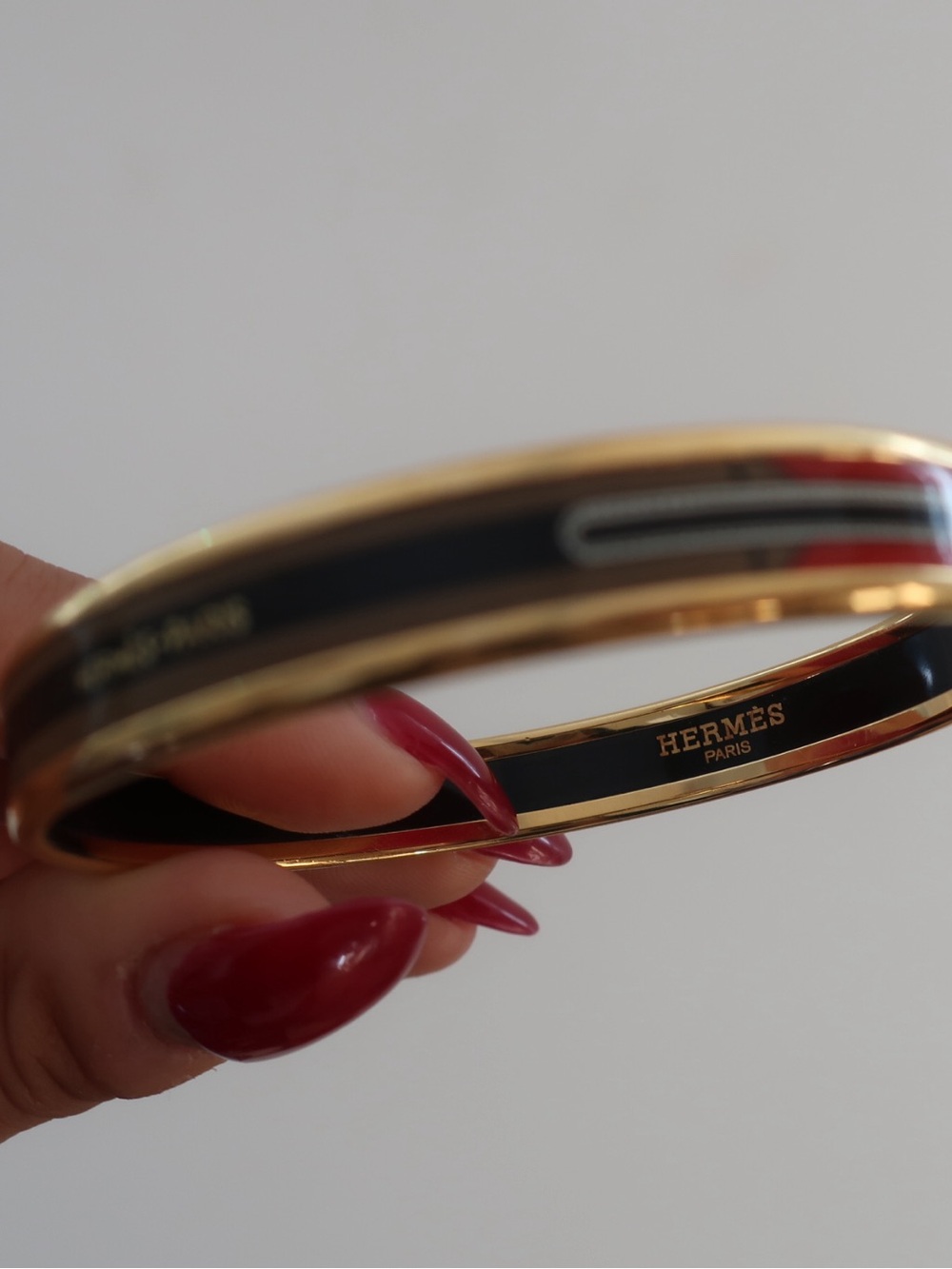 HERMES Paris Goldtone Black Red Enamel Belt Motif Bangle Bracelet